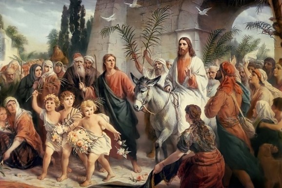 Jesus enters Jerusalem on a donkey